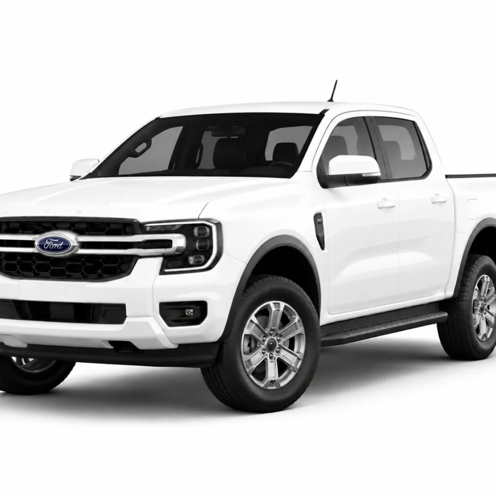White Ford pickup truck, shown from the front‑right three-quarter angle, highlighting the grille and headlights; clear background.