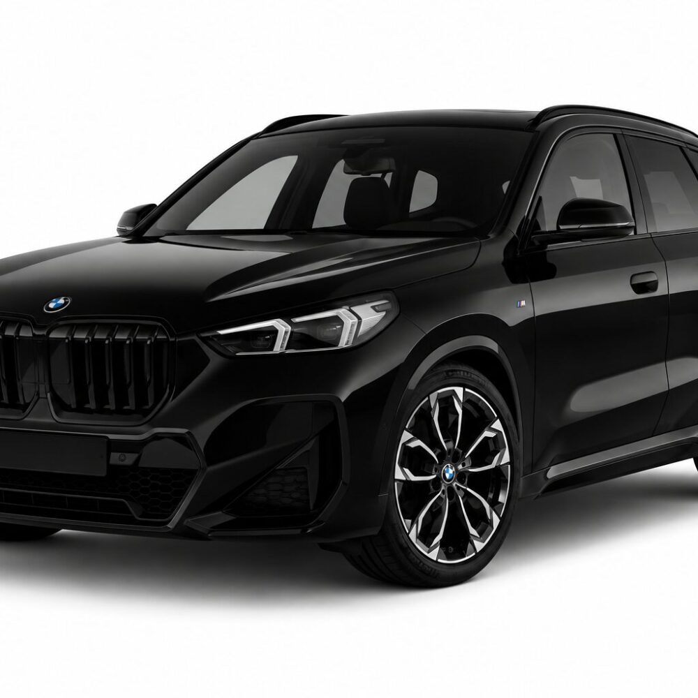 Black BMW SUV in a front-right 3/4 view, showing bold kidney grille and sporty alloy wheels.