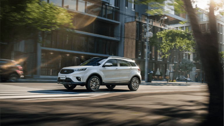 White SUV driving through an urban street with modern glass buildings and sunlight glare on the scene.