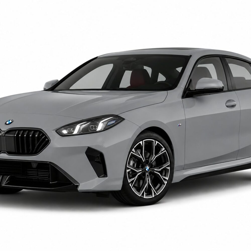 Gray BMW sedan shown from a front-right angle, with a sculpted hood, signature kidney grille and large multi-spoke wheels.