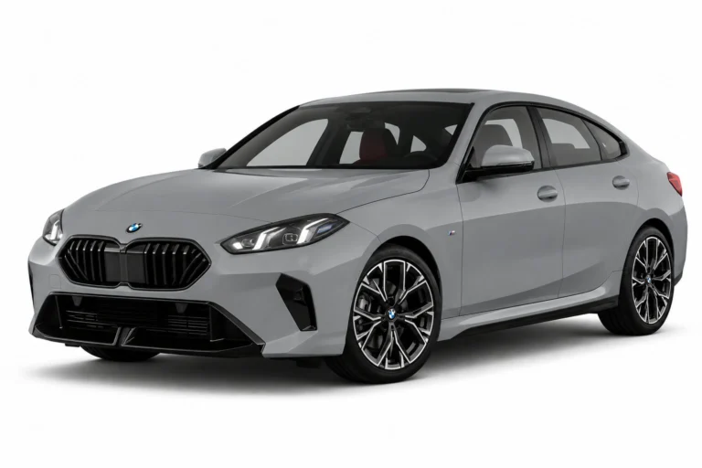 Gray BMW sedan shown from a front-right angle, with a sculpted hood, signature kidney grille and large multi-spoke wheels.