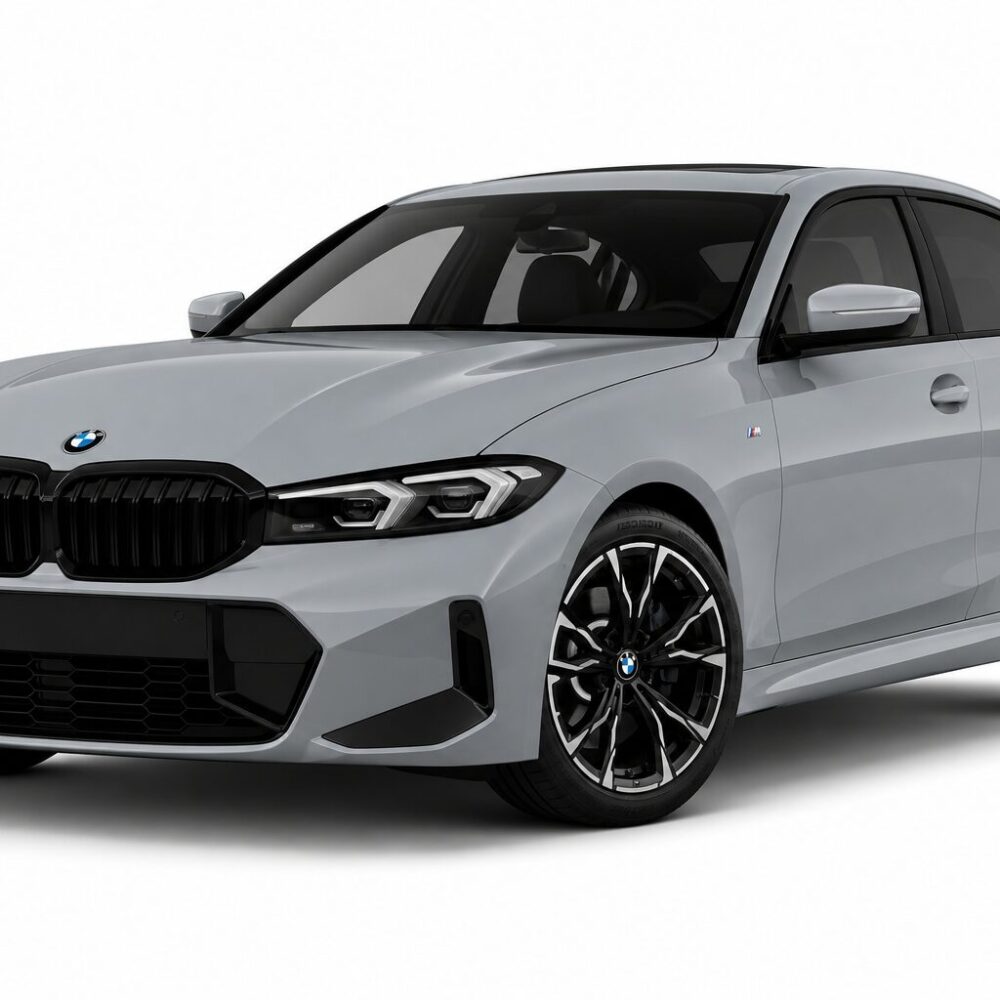 Gray BMW sedan shown in a front-left three-quarter view with a bold black kidney grille and alloy wheels, highlighting its sporty design.