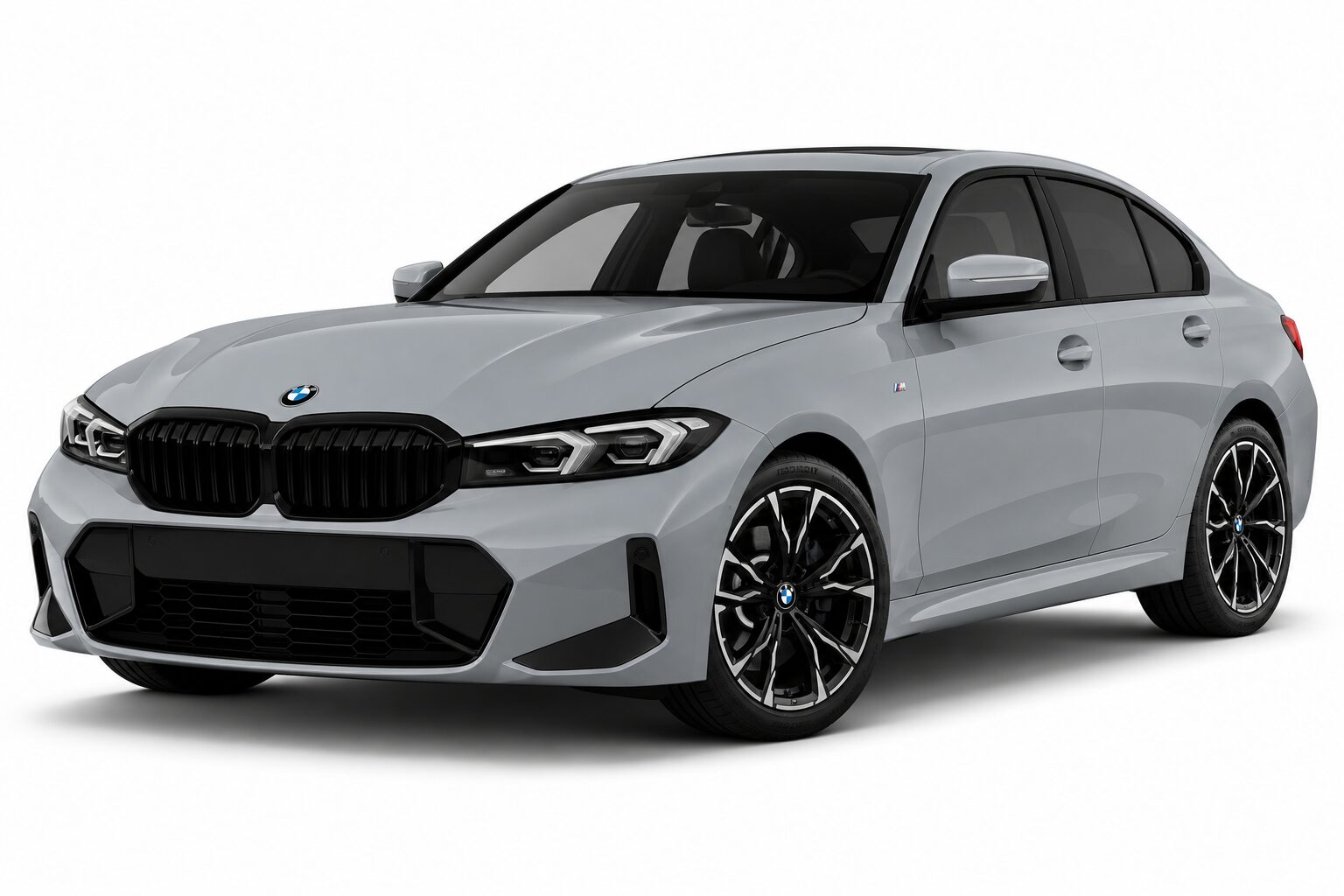 Gray BMW sedan shown in a front-left three-quarter view with a bold black kidney grille and alloy wheels, highlighting its sporty design.