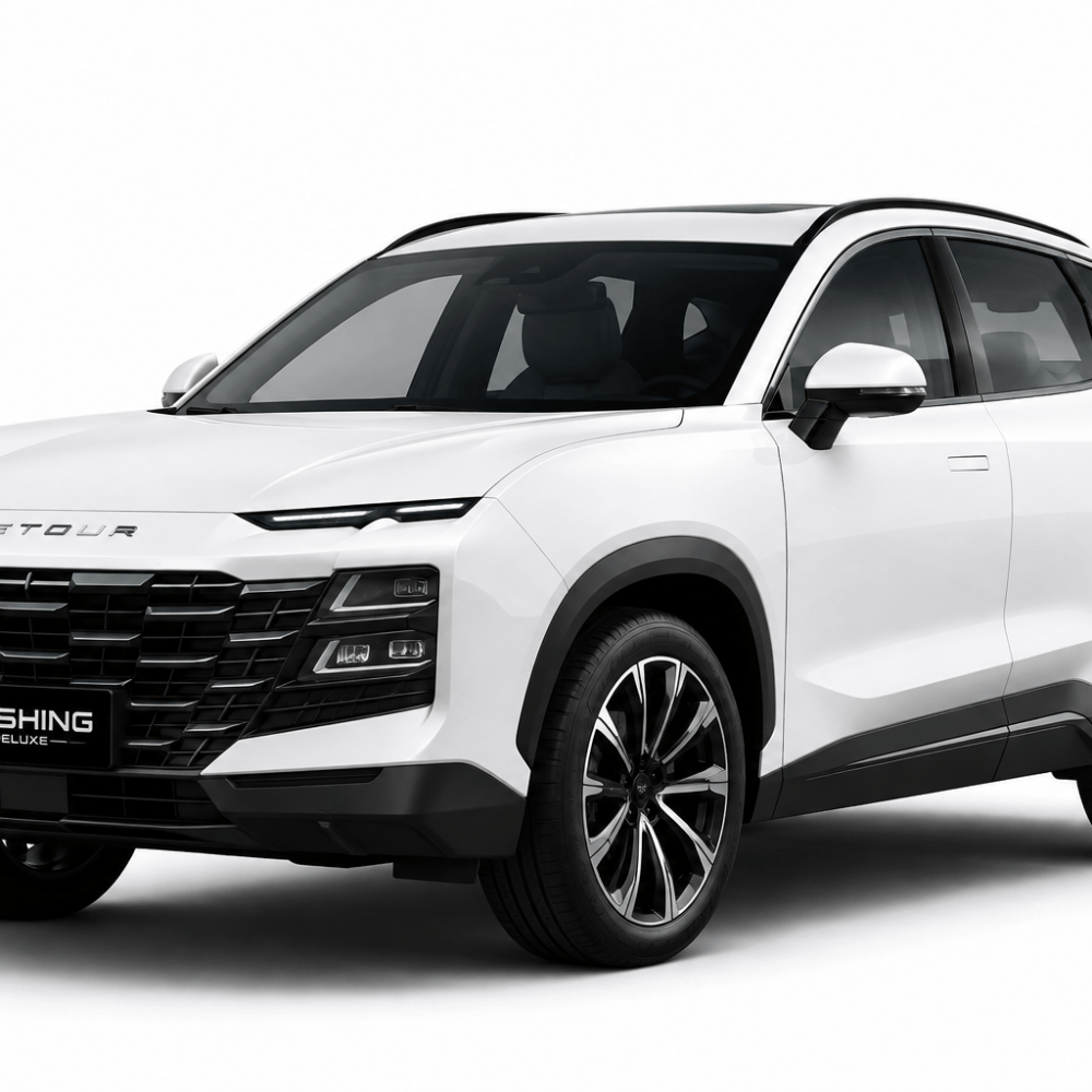 Front-left three-quarter view of a white SUV with a bold black grille and large alloy wheels, showcasing modern design.